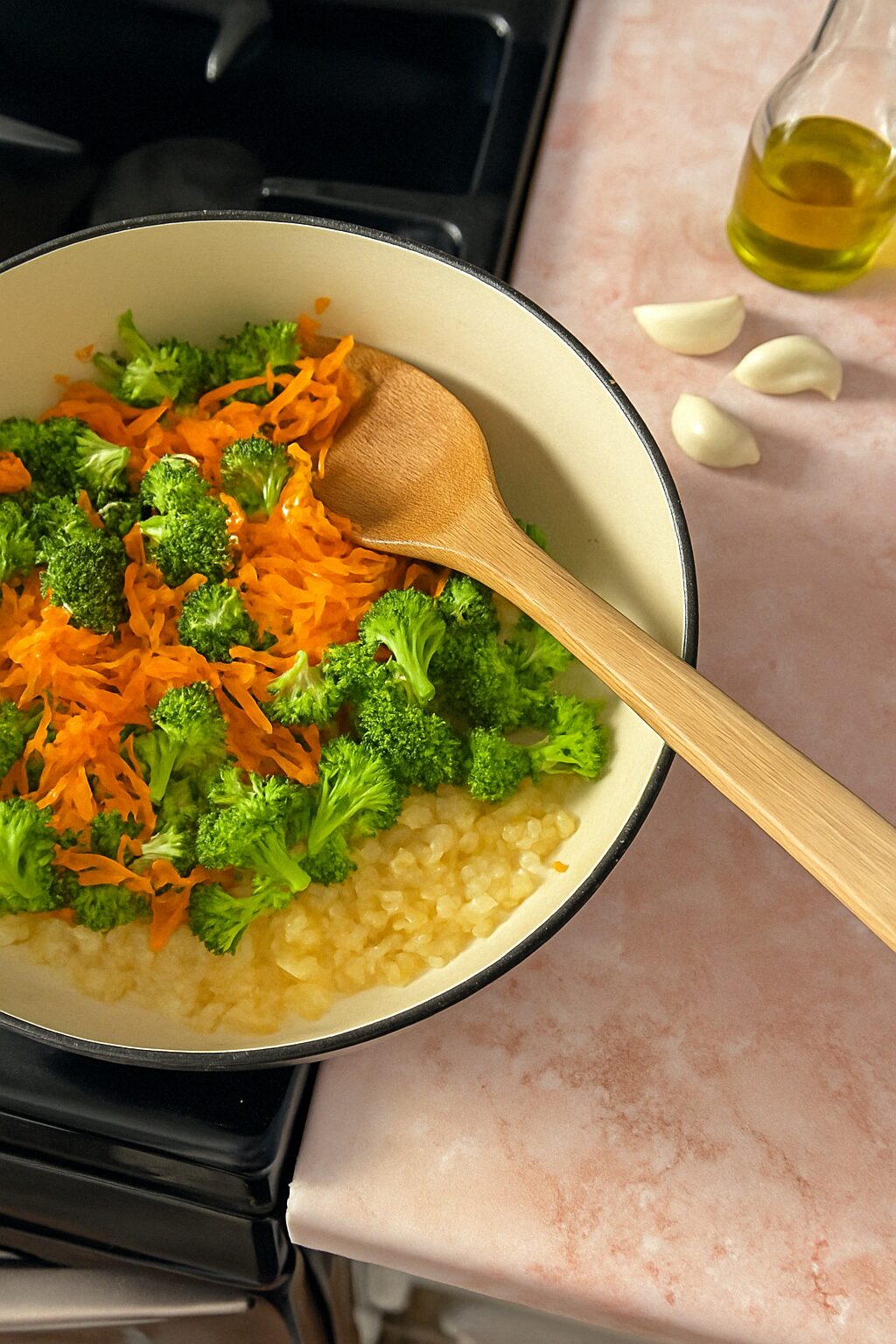 Add broccoli, carrot, broth, almond milk, Dijon mustard, and smoked paprika.

Season with salt and pepper. Bring it to a light boil, then turn the heat down and simmer.